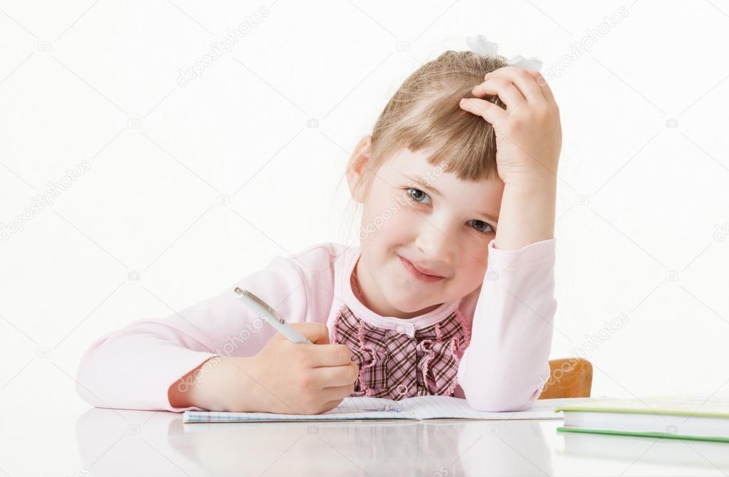 School girl learning to write