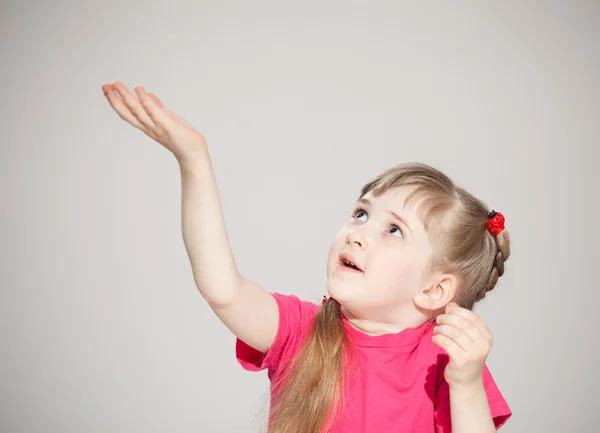 Little girl reaching out her palm — Stock Photo, Image