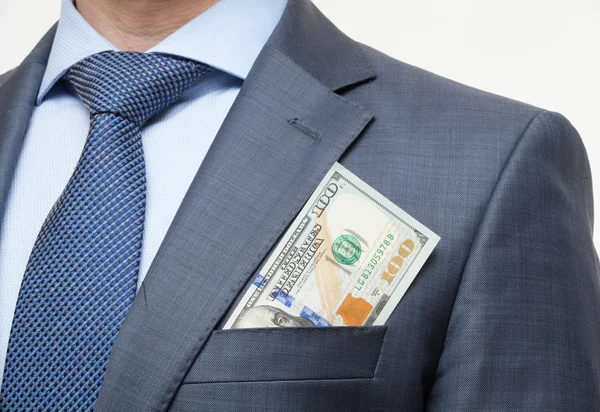 Geld in de borstzak — Stockfoto