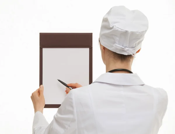 Doctor holding empty clipboard — Stock Photo, Image