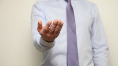 Unrecognizable businessman asking something