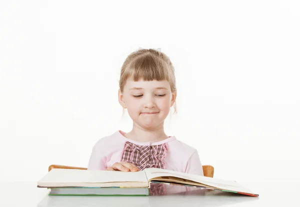 Pretty little girl reading book — Stock Photo, Image