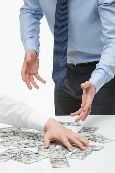 Businessman appropriating money — Stock Photo, Image
