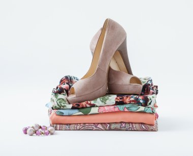 Clothes and shoes on white