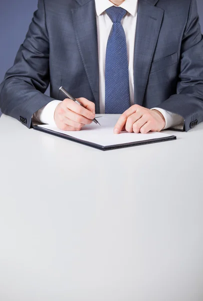 Businessman making note — Stock Photo, Image