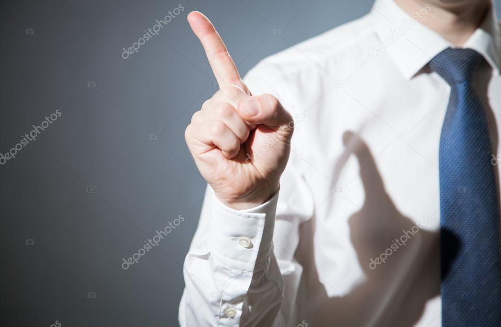 Businessman hand pointing