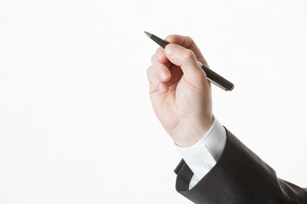 Hombre de negocios escribiendo con pluma — Foto de Stock