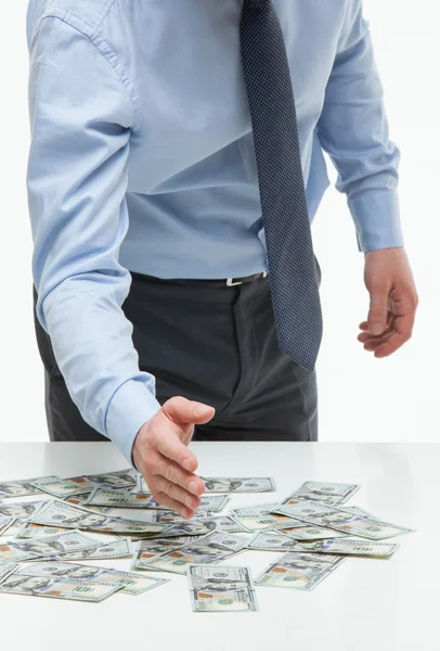 Boss dividing money among collaborators — Stock Photo, Image