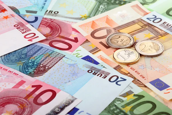 Euro bancnote și monede — Fotografie, imagine de stoc
