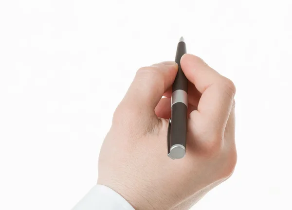 Affärsmannens handen håller en penna — Stockfoto