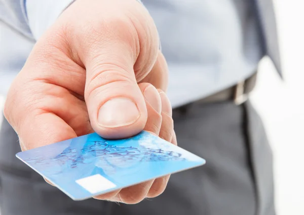 Mão de empresário dando cartão de crédito — Fotografia de Stock