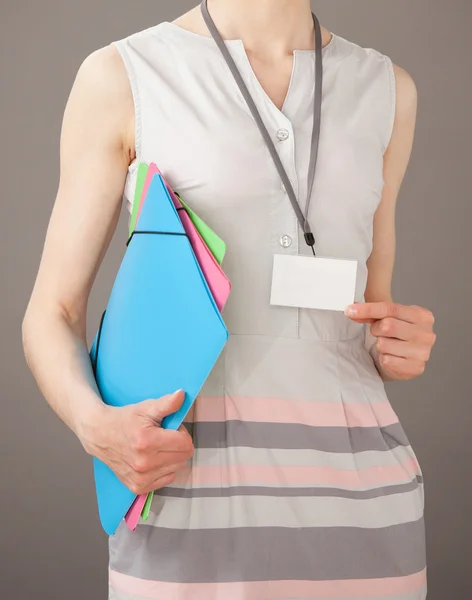 Young woman with bright folders — Stock Photo, Image