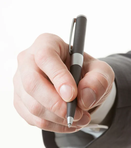 Podnikatel je ruka drží pero — Stock fotografie