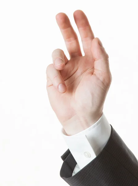 Businessman's hand showing valedictory gesture — Stock Photo, Image