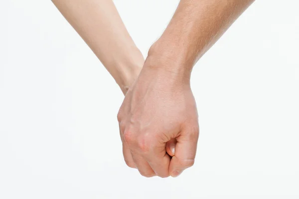 Man's hand holding woman's hand — Stock Photo, Image