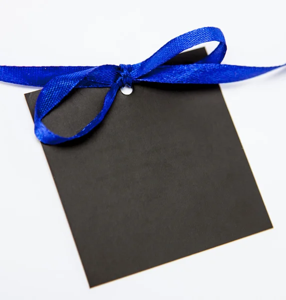 Empty black card with bow — Stock Photo, Image
