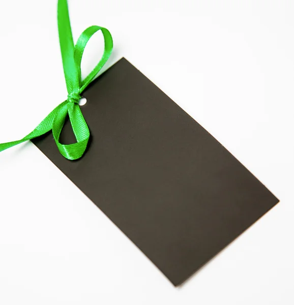 Empty black card with bow — Stock Photo, Image