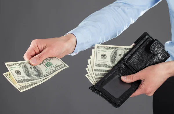 Woman's hands paying money — Stock Photo, Image