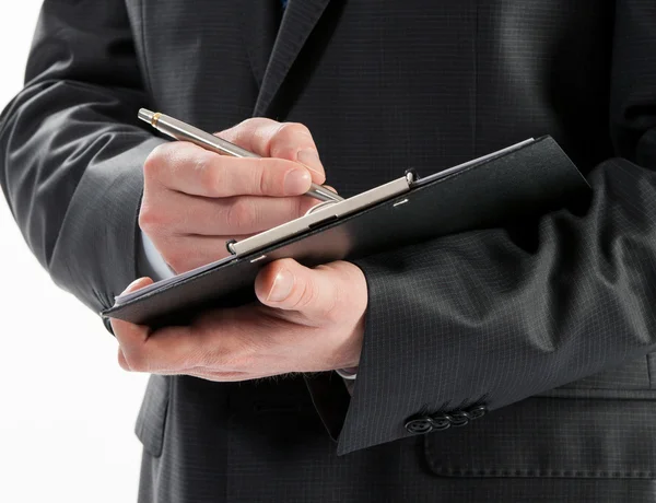 Businessman signing documents — Stock Photo, Image