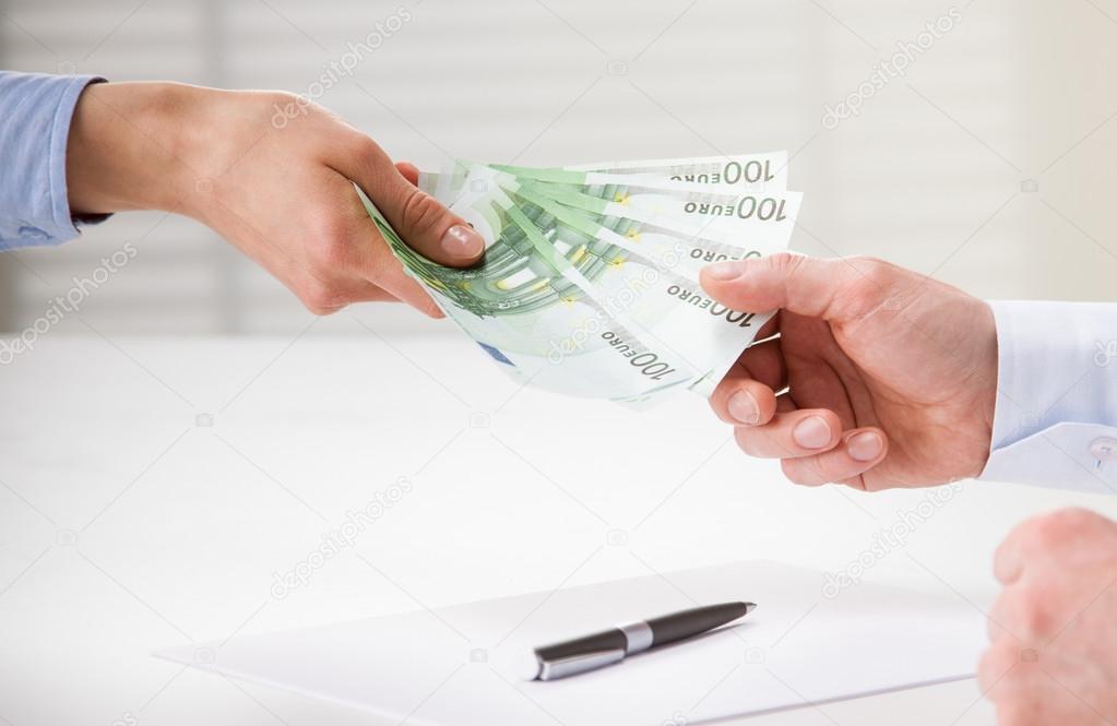 Business people transfering euro banknotes