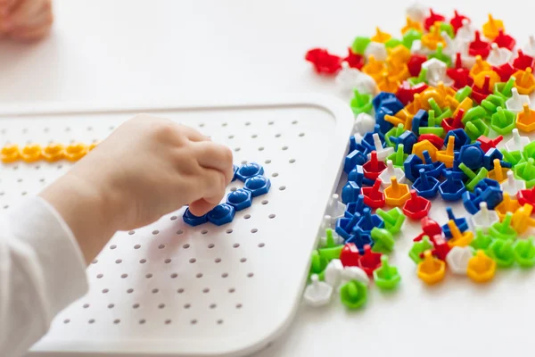 Child playing with mosaic — Stock Photo, Image