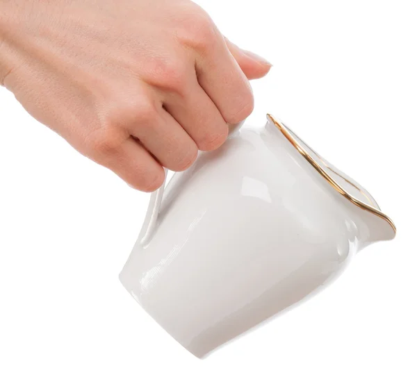 ミルク水差しを持つ女性の手 — ストック写真
