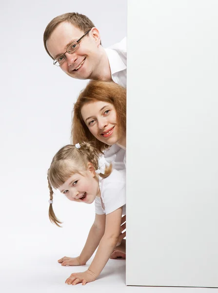 Happy family playing with daughter — Stock Photo, Image
