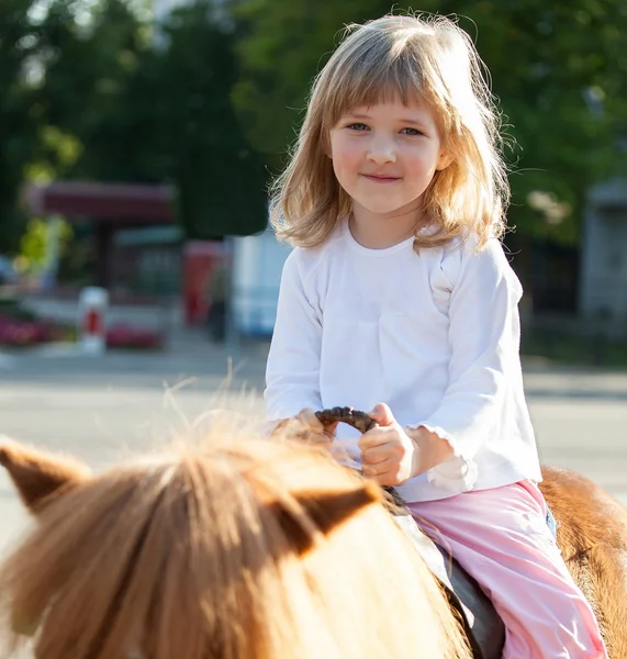 Little girl  on a pony — Stock Photo, Image