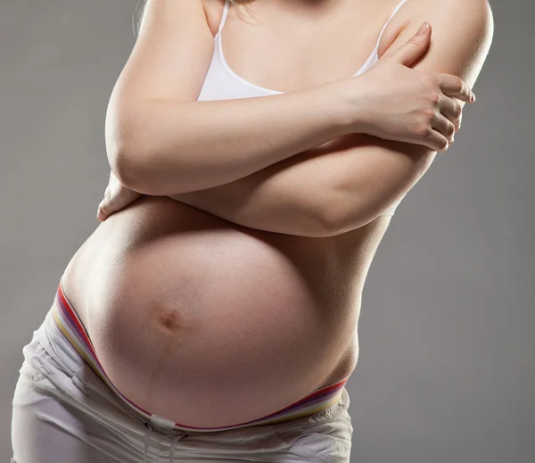 怀孕的女性腹部 — 图库照片