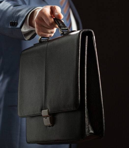 Businessman with leather briefcase