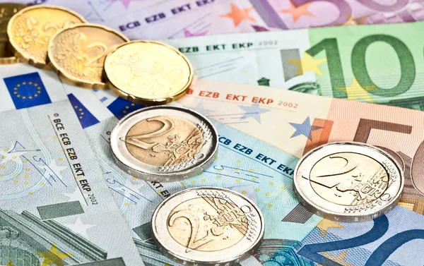 Banconote e monete in euro — Foto Stock