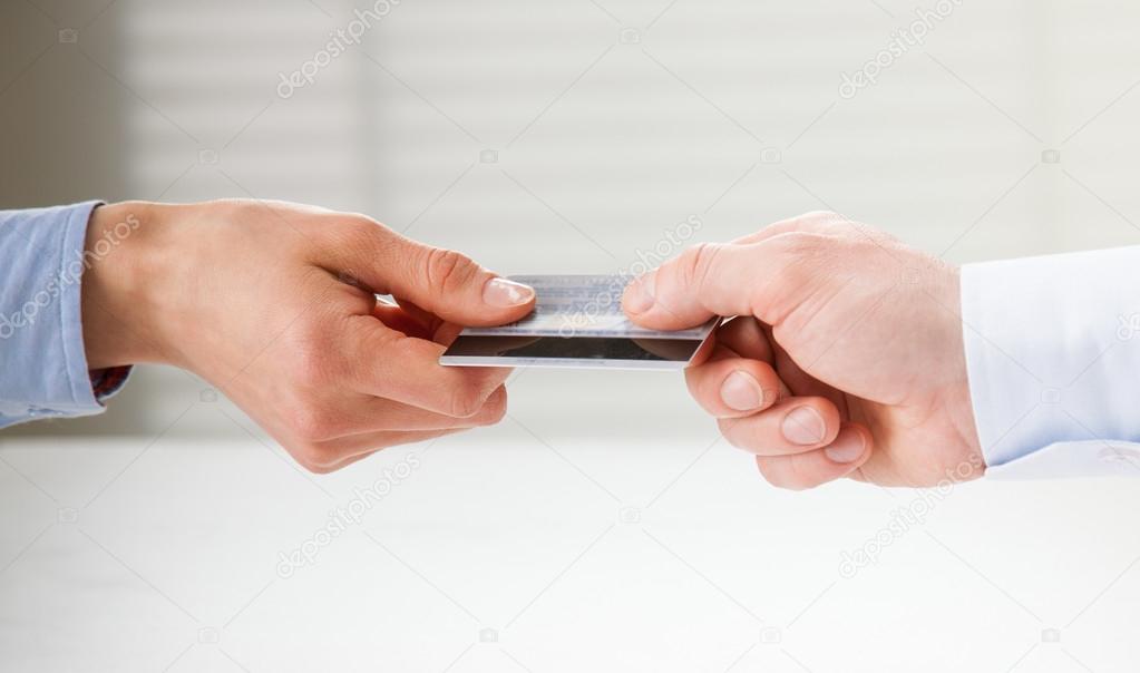 Exchanging credit card over the table