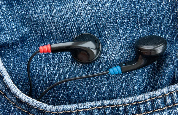 Black headphones in the pocket — ストック写真