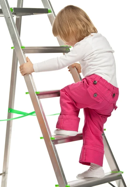 Babymeisje met trapladder — Stockfoto