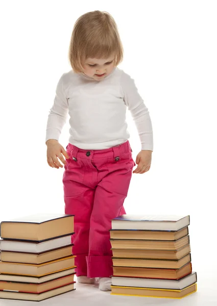 Little girl with books — Stock Photo, Image