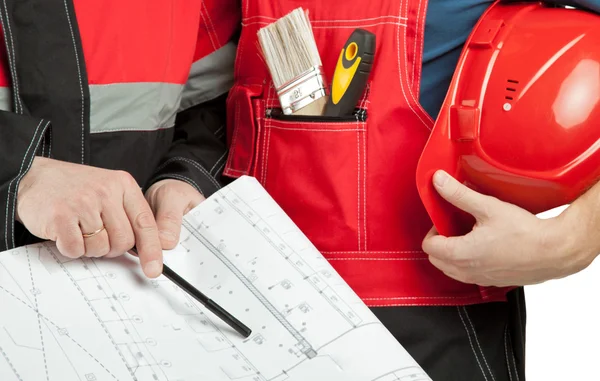 Lavoratori in uniforme con progetto — Foto Stock