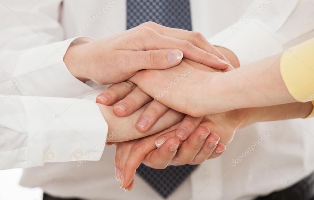 Business team uniting hands