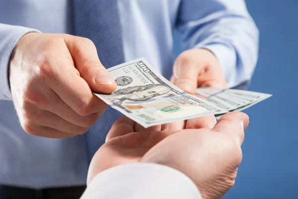 Hands exchanging money — Stock Photo, Image