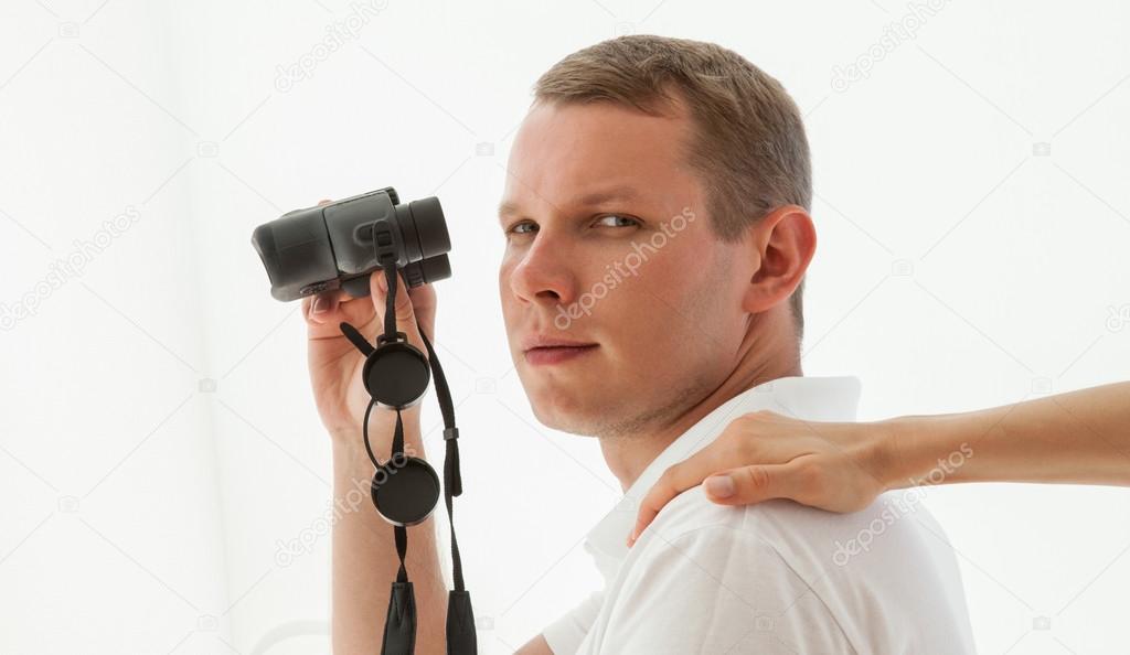 Young man with binocular 