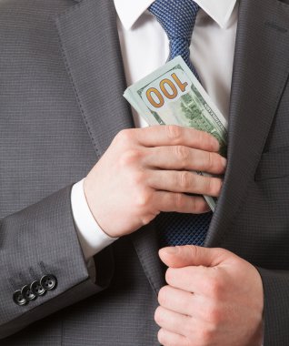 Bir cebinde dolar koyarak işadamı