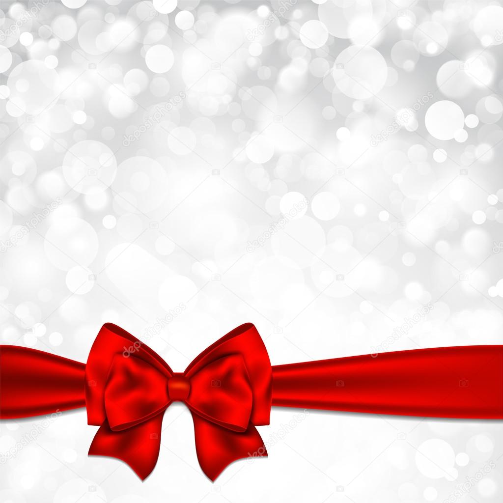 Shiny silver starry christmas background with red bow.