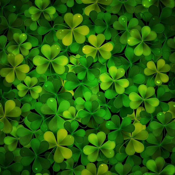 Hintergrund mit grünen Shamrock Blättern — Stockvektor