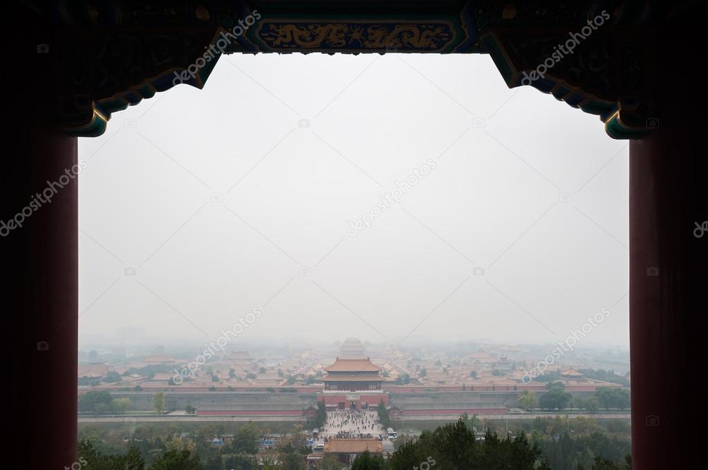 View of the Forbidden City from Jingshan Park on a polluted day in Beijing, China