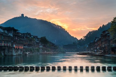 Sunrise on the Tuojiang River, Fenghuang, Hunan Province, China clipart