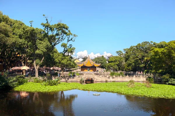 Pond and pavilion outside Puji Temple on the Buddhist island of Putuoshan, China
