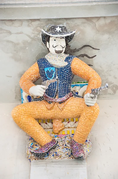 Ceramic cowboy statue at Wat Pariwat, Bangkok — ストック写真
