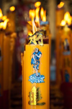 Burning candle at a Chinese temple