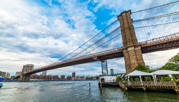 NEW YORK, USA - September 28, 2018: Brooklyn Bridge Park with Brooklyn Bridge view. New York City, USA.