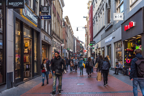 AMSTERDAM, NETHERLANDS - SEPTEMBER 24, 2017: Amsterdam Nieuwendijk Street. The famous street is the main shopping mile of Amsterdam. Netherlands.
