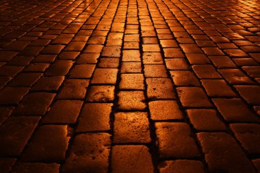 Gece lambalı kaldırım taşları. Taş dokusu.